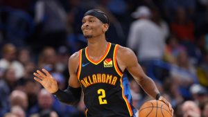 Oklahoma City Thunder guard Shai Gilgeous-Alexander dribbles during the second half of an NBA basketball game. (Nate Billings/AP)