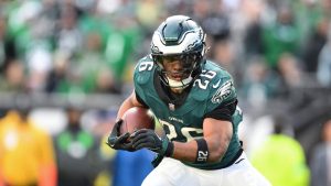 Philadelphia Eagles running back Saquon Barkley runs the ball for a two point conversion during the second half of an NFL game against the Carolina Panthers, Sunday, Dec. 8, 2024, in Philadelphia. (AP/Terrance Williams)