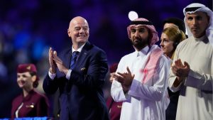 FIFA President Gianni Infantino, left, applauds during the medals ceremony after the Soccer Club World Cup final match between Manchester City FC and Fluminense FC at King Abdullah Sports City Stadium in Jeddah, Saudi Arabia, Friday, Dec. 22, 2023. (Manu Fernandez/AP)