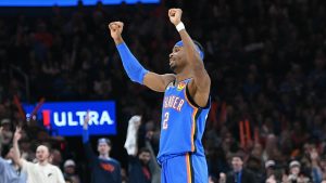 Oklahoma City Thunder guard Shai Gilgeous-Alexander celebrates after a basket during the first half of an NBA basketball game against the Minnesota Timberwolves, Tuesday, Dec. 31, 2024, in Oklahoma City. (Kyle Phillips/AP)