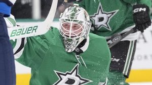 Dallas Stars goaltender Jake Oettinger (29) deflects a shot during the second period of an NHL hockey game against the Winnipeg Jets, Sunday, Dec. 1, 2024, in Dallas. (LM Otero/AP)
