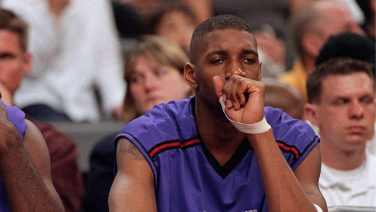 Toronto Raptors forward Tracy McGrady sits dejectedly on the bench as the clock winds down during the Raptors 83-91 loss to the Detroit Pistons in NBA action in Toronto on Sunday April 25, 1999. (Frank Gunn/CP)