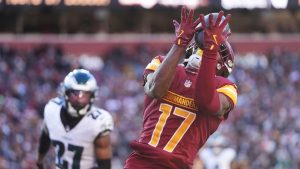 Washington Commanders wide receiver Terry McLaurin making a catch to score a touchdown against Philadelphia Eagles cornerback Quinyon Mitchell during the first half of an NFL football game, Sunday, Dec. 22, 2024, in Landover, Md. (Stephanie Scarbrough/AP)