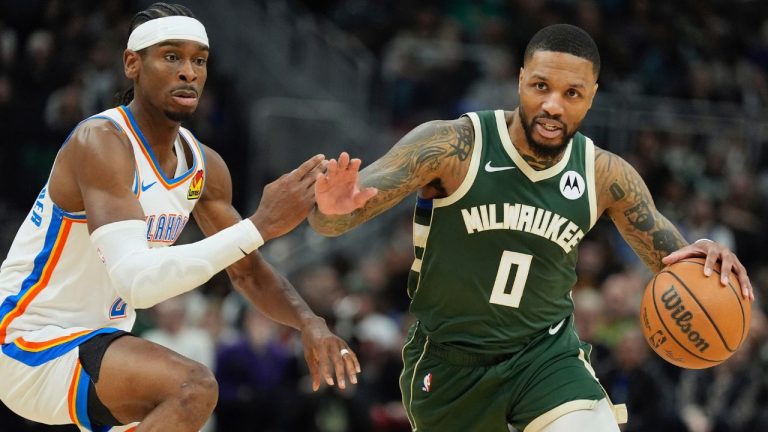 Milwaukee Bucks' Damian Lillard gets past Oklahoma City Thunder's Shai Gilgeous-Alexander during the first half of an NBA basketball game Sunday, March 24, 2024, in Milwaukee. (Morry Gash/AP)