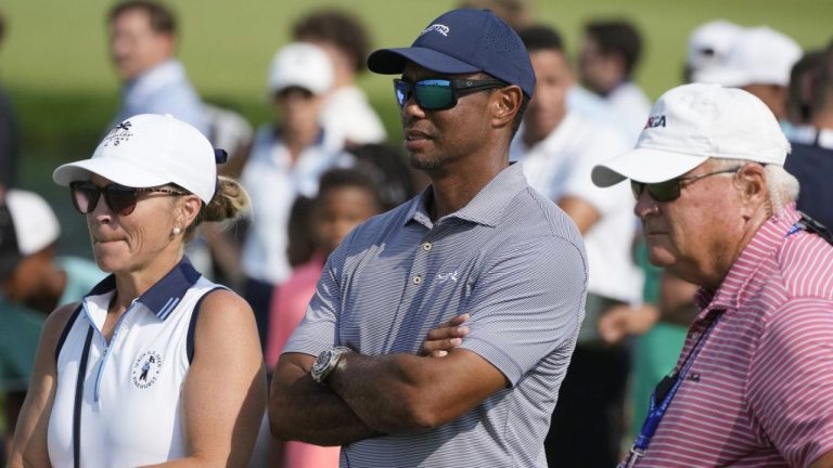 Tiger Woods watches his son Charlie Woods during the second round of stroke play at the U.S. Junior Amateur Golf Championship on July 23, 2024, in Bloomfield Township, Mich. (Carlos Osorio/AP)
