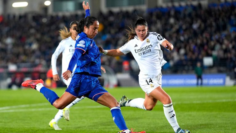 Chelsea's Mayra Ramírez, left, controls the ball by the Real Madrid's María Mendez, right, during the women's Champions League, group B soccer match between Real Madrid and Chelsea at the Alfredo Di Stefano stadium in Madrid, Spain, Tuesday, Dec. 17, 2024. (Manu Fernandez/AP)