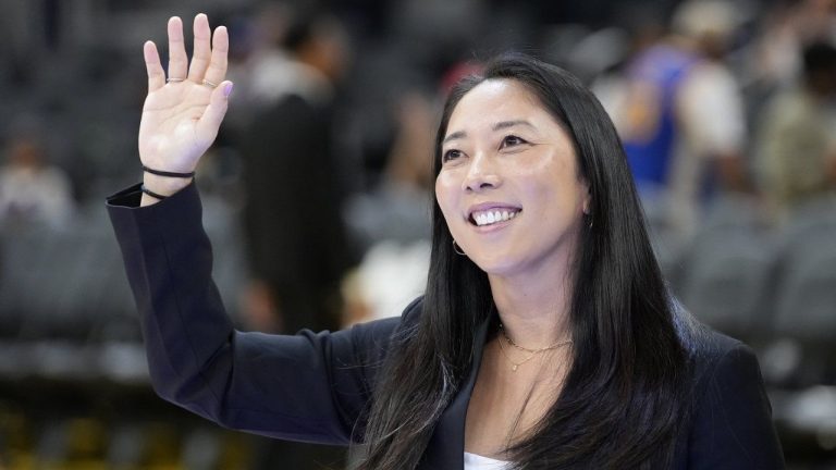 FILE - Golden State Valkyries WNBA head coach Natalie Nakase waves before an NBA preseason basketball game between the Golden State Warriors and the Sacramento Kings. (AP Photo/Jeff Chiu, File)