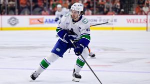 Vancouver Canucks' Quinn Hughes in action during an NHL hockey game against the Philadelphia Flyers, Saturday, Oct. 19, 2024, in Philadelphia. (Derik Hamilton/AP)