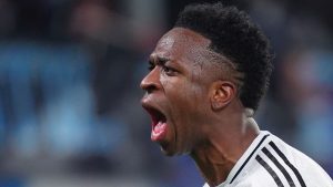 Real Madrid's Vinicius Junior celebrate after scoring during a Champions League opening phase soccer match between Atalanta and Real Madrid at the Bergamo's stadium, in Bergamo, Italy, Tuesday, Dec. 10, 2024. (Spada/LaPresse via AP)