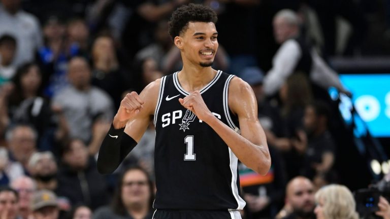 San Antonio Spurs forward Victor Wembanyama celebrates a basket late in the second half of an NBA basketball game against the Golden State Warriors, Saturday, Nov. 23, 2024, in San Antonio. (Darren Abate/AP)