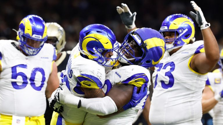 Los Angeles Rams running back Kyren Williams, center left, celebrates his rushing touchdown with guard Kevin Dotson during the second half of an NFL football game against the New Orleans Saints, Sunday, Dec. 1, 2024, in New Orleans. (Butch Dill/AP)