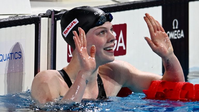 Canada's Ingrid Wilm reacts after winning a 100-meter backstroke semifinal during the World Short Course Swimming Championships in Budapest, Hungary, Tuesday, Dec. 10, 2024. (Denes Erdos/AP)