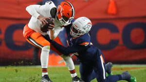 Cleveland Browns quarterback Jameis Winston (5) is sacked by Denver Broncos linebacker Nik Bonitto during the second half of an NFL football game, Monday, Dec. 2, 2024, in Denver. (David Zalubowski/AP)