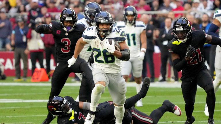 Seattle Seahawks running back Zach Charbonnet runs for a touchdown against the Arizona Cardinals during the first half of an NFL game, Sunday, Dec. 8, 2024, in Glendale, Ariz. (AP/Rick Scuteri)