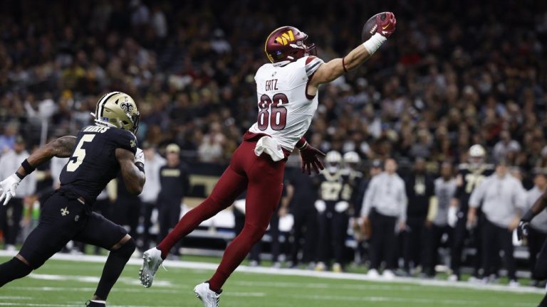 Washington Commanders tight end Zach Ertz makes a catch in the first half of an NFL game against the New Orleans Saints in New Orleans, Sunday, Dec. 15, 2024. (AP/Butch Dill)