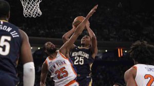 New Orleans Pelicans' Trey Murphy III, right, shoots the ball against New York Knicks' Mikal Bridges, left, during the second half of an NBA basketball game, Sunday, Dec. 1, 2024, in New York. (Pamela Smith/AP)