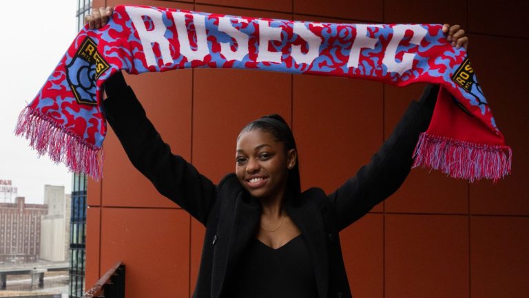 Latifah Abdu poses after Montreal Roses FC soccer team announces her as the first player signed to their team in Montreal on Tuesday, Dec. 17, 2024. (Christinne Muschi/CP)