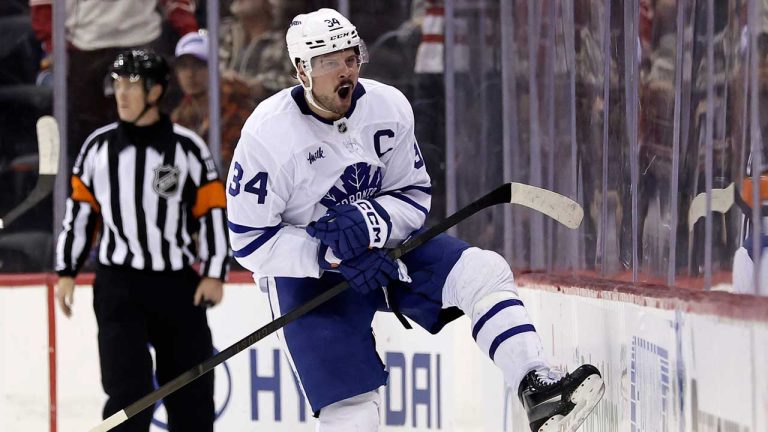 Toronto Maple Leafs center Auston Matthews (34) reacts after scoring the game winning goal in a shootout of an NHL hockey game against the New Jersey Devils. (Adam Hunger/AP)