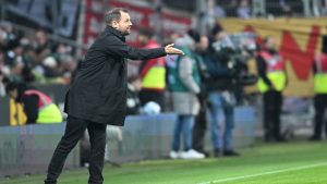 Berlin's head coach Bo Svensson gestures during the German Bundesliga soccer match between Werder Bremen and FC Union Berlin in Bremen, Germany, Saturday, Dec. 21, 2024. (Carmen Jaspersen/dpa via AP)