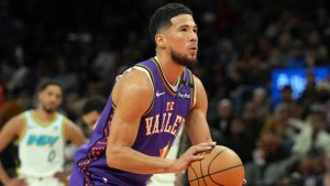 Phoenix Suns guard Devin Booker (1) during the first half of an NBA basketball game against the Indiana Pacers, Thursday, Dec. 19, 2024, in Phoenix. (Rick Scuteri/AP)