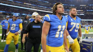 Los Angeles Chargers place kicker Cameron Dicker (11) walks off the field during the halftime break in an NFL football game against the Denver Broncos, Thursday, Dec. 19, 2024, in Inglewood, Calif. (Ryan Sun/AP)