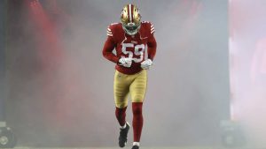 San Francisco 49ers linebacker De'Vondre Campbell jogs onto the field before an NFL football game against the Los Angeles Rams. (Jed Jacobsohn/AP)