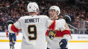 Florida Panthers' Sam Bennett (9) and Carter Verhaeghe (23) celebrate a goal against the Edmonton Oilers during third period NHL action in Edmonton on Monday, December 16, 2024. (Jason Franson/CP)