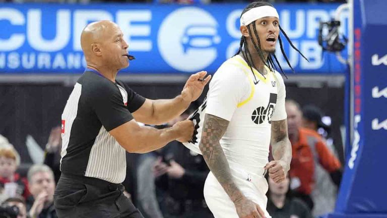 Utah Jazz guard Jordan Clarkson (00) gets into a stance with Detroit Pistons forward Ronald Holland II during the second half of an NBA basketball game, Thursday, Dec. 19, 2024, in Detroit. Both Clarkson and Holland were ejected. (Carlos Osorio/AP)