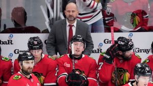 Chicago Blackhawks interim head coach Anders Sorensen watches players during the third period of an NHL hockey game against the Seattle Kraken in Chicago, Thursday, Dec. 19, 2024. The Blackhawks won 3-1. (Nam Y. Huh/AP)