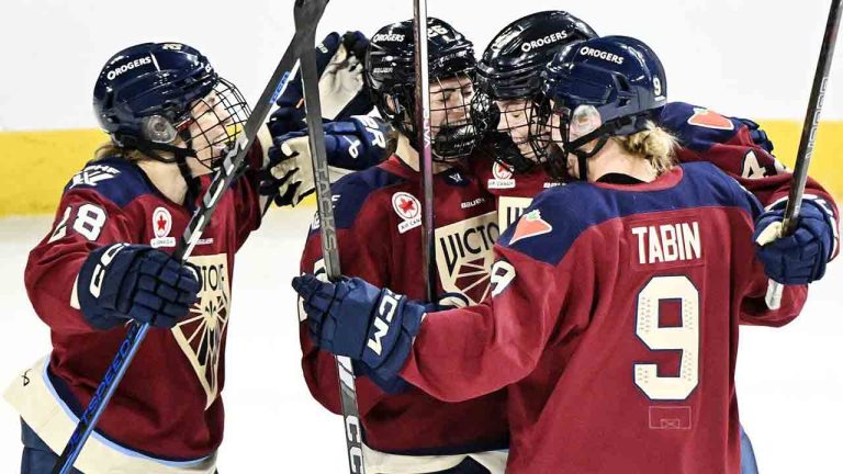 Montreal Victoire's Claire Dalton (42) celebrates with teammates after scoring against Boston Fleet during first period PWHL hockey action in Laval, Que., Monday, Dec. 30, 2024. (Graham Hughes/CP)