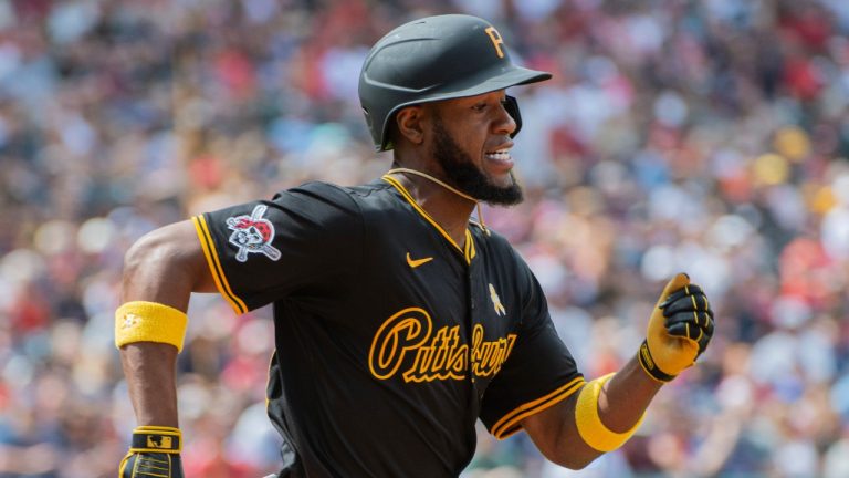 Pittsburgh Pirates' Bryan De La Cruz tries for an infield single during the fifth inning of a baseball game in Cleveland, Sunday, Sept. 1, 2024. (Phil Long/AP)