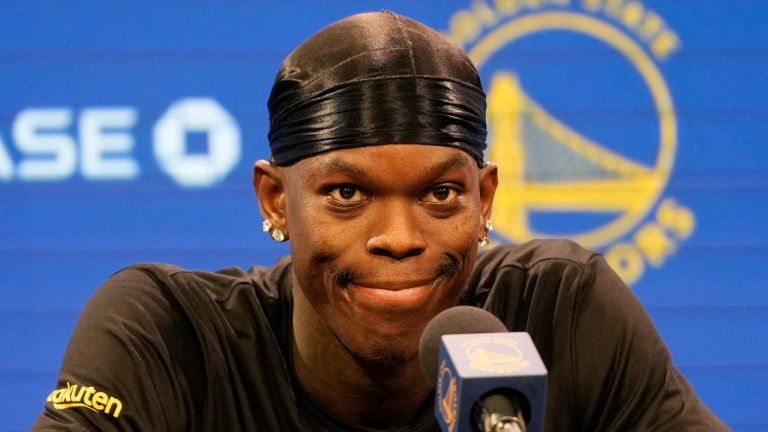 Golden State Warriors guard Dennis Schroder speaks at a news conference at the NBA basketball team's facility in San Francisco, Tuesday, Dec. 17, 2024. (Jeff Chiu/AP)