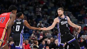 Sacramento Kings forward Domantas Sabonis (11) celebrates his 3-point shot with guard Malik Monk (0) in the second half of an NBA basketball game in New Orleans, Thursday, Dec. 12, 2024. The Kings won 111-109. (Gerald Herbert/AP)