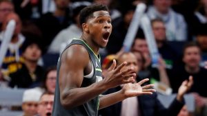 Minnesota Timberwolves guard Anthony Edwards (5) reacts to a foul call against him that benefits the Golden State Warriors in the third quarter of an NBA basketball game Saturday, Dec. 21, 2024, in Minneapolis. (Bruce Kluckhohn/AP)