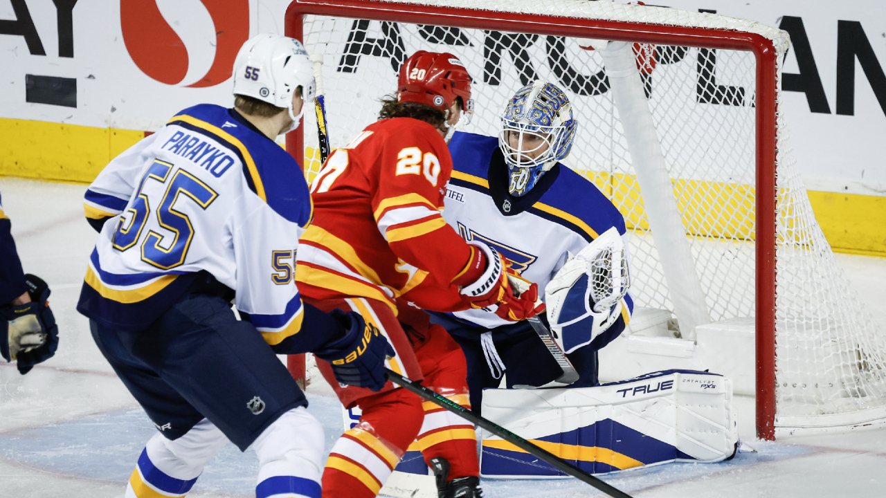 Flames Fall in Contentious Overtime Loss to Blues