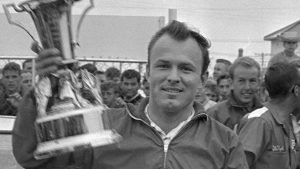 FILE - In this Feb. 14, 1965, file photo, Fred Lorenzen, of Elmhurst, Ill., gives a victory wave after winning the Daytona 500 mile stock car auto race which was halted by rain at the end of 133 laps, in Daytona Beach, Fla. (AP)