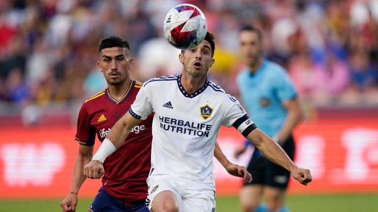 LA Galaxy midfielder Gastón Brugman, right, watches the ball in front of Real Salt Lake midfielder Pablo Ruiz during the first half of an MLS soccer match Wednesday, May 31, 2023, in Sandy, Utah. (Rick Bowmer/AP)