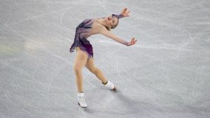 Amber Glenn, of the United States, competes in the women's free skating segment at the ISU Grand Prix Finals of Figure Skating, Saturday, Dec. 7, 2024, in Grenoble, France. (Laurent Cipriani/AP)