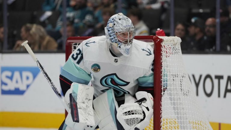 Seattle Kraken goaltender Philipp Grubauer (31) reacts after letting a goal slip past against the Colorado Avalanche during the third period of an NHL hockey game Tuesday, Nov. 5, 2024, in Denver. (Jack Dempsey/AP)