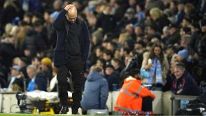 Manchester City's head coach Pep Guardiola reacts during the English Premier League soccer match between Manchester City and Manchester United at the Etihad Stadium. (Dave Thompson/AP)
