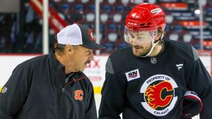 Guy Gaudreau skates with Calgary Flames defenceman Rasmus Andersson during practice. (Calgary Flames/X)