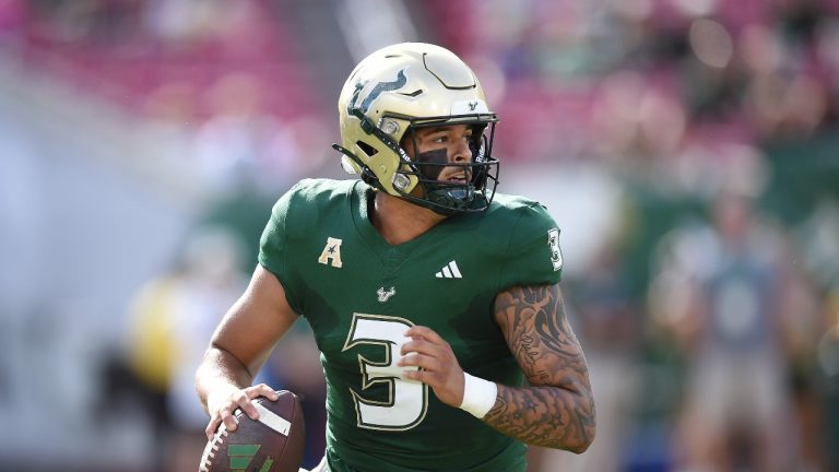 University of South Florida's Bryce Archie (3) drops back to pass during an NCAA football game on Saturday, Oct.19, 2024, in Tampa, Fla. (Kelly Sheehan/AP Photo)