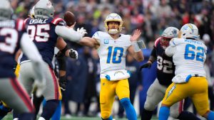 Los Angeles Chargers quarterback Justin Herbert (10) throws a pass against the New England Patriots during the first half of an NFL football game, Saturday, Dec. 28, 2024, in Foxborough, Mass. (Robert F. Bukaty/AP)