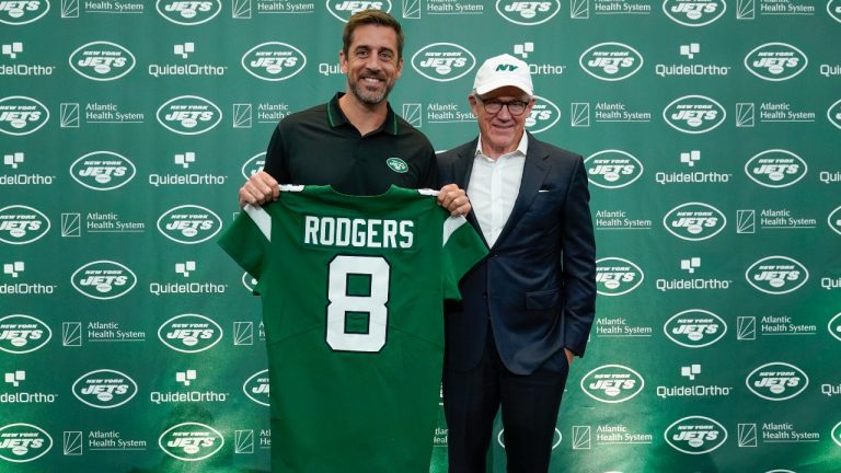 New York Jets' quarterback Aaron Rodgers, left, poses for a picture with Jets' owner Woody Johnson after an NFL football news conference at the Jets' training facility in Florham Park, N.J., Wednesday, April 26, 2023. (Seth Wenig/AP Photo)