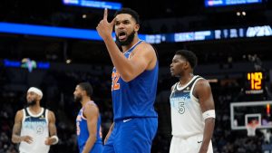 New York Knicks centre Karl-Anthony Towns (32) reacts toward a referee during the second half of an NBA basketball game against the Minnesota Timberwolves, Thursday, Dec. 19, 2024, in Minneapolis. (Abbie Parr/AP)