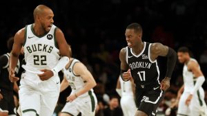 Brooklyn Nets' Dennis Schroder (17) reacts after scoring during the first half of an NBA basketball game against the Milwaukee Bucks, Sunday, Dec. 8, 2024, in New York. (Heather Khalifa/AP)