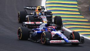 RB driver Liam Lawson, of New Zealand, front, and Red Bull driver Sergio Perez of Mexico, steer their cars during the sprint qualifying session ahead of the Brazilian Formula One Grand Prix auto race, at the Interlagos racetrack, in Sao Paulo, Brazil, Friday, Nov. 1, 2024. (Ettore Chiereguini/AP)