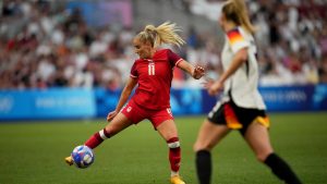 Canada's Adriana Leon fights for the ball during a women's quarterfinal soccer match between Canada and Germany at the 2024 Summer Olympics, Saturday, Aug. 3, 2024, at Marseille Stadium in Marseille, France. (Daniel Cole/AP)