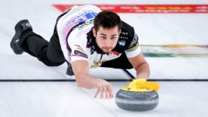 olton Lott makes a shot while playing Team Einarson/Gushue during the Canadian Mixed Doubles Curling Championship final in Calgary, Alta., Thursday, March 25, 2021. (Jeff McIntosh/CP)