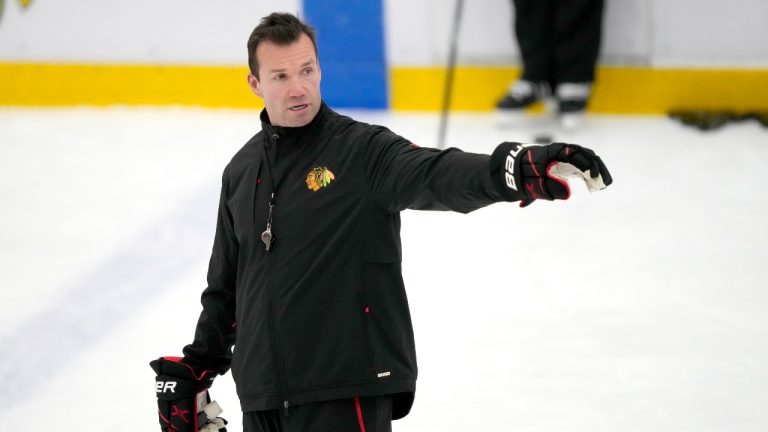 Chicago Blackhawks head coach Luke Richardson talks to his players during the team's NHL hockey training camp Thursday, Sept. 19, 2024, in Chicago. (Charles Rex Arbogast/AP)